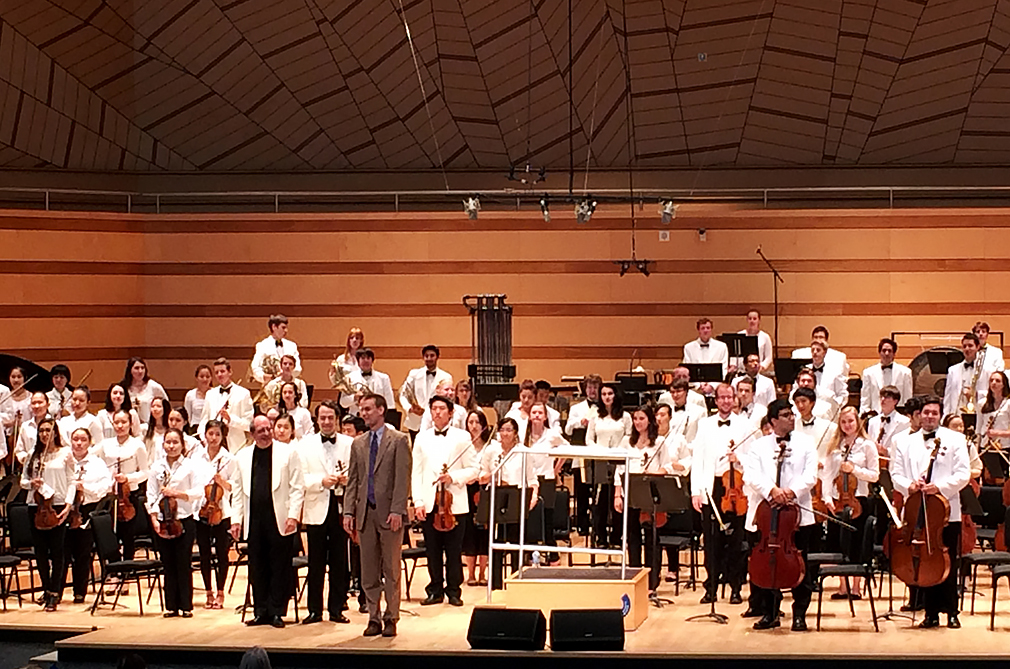 Luke Carlson taking a bow with the Aspen Festival Orchestra